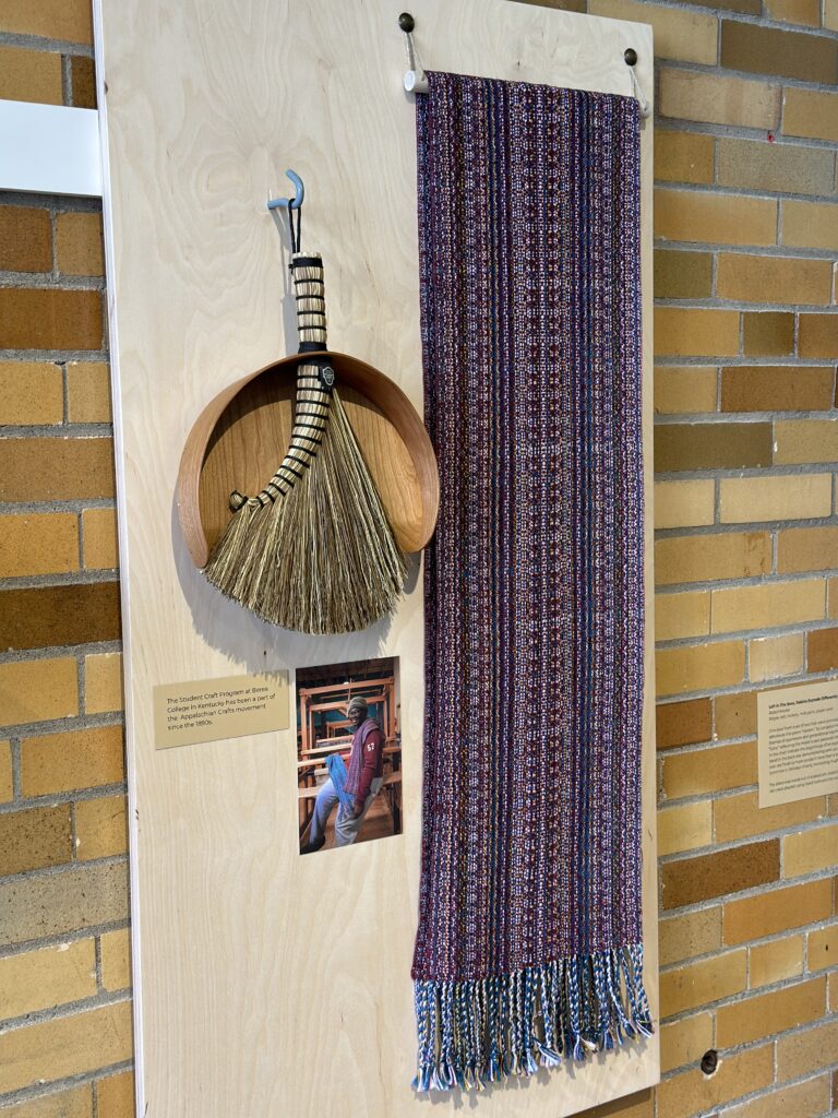 Broom and woven textile made by Berea College student Leeroy Mabvuta